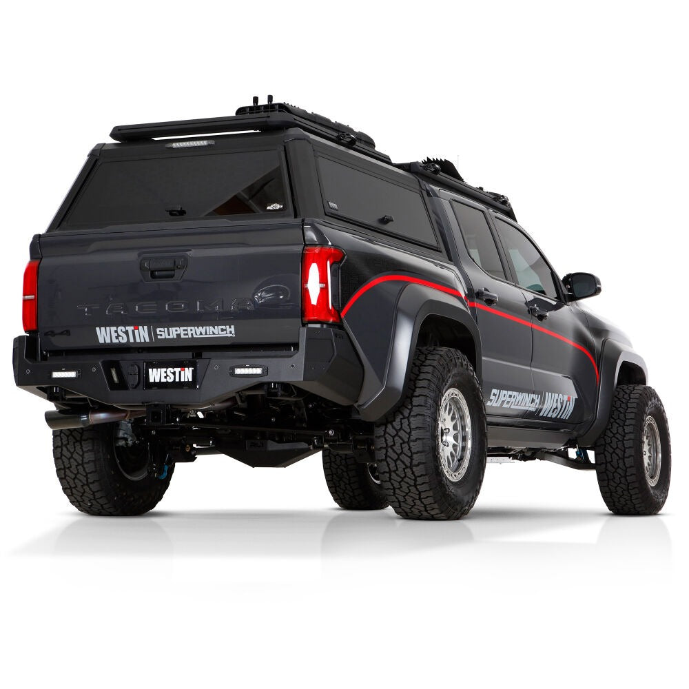 Black off-road vehicle with Westin Superwinch branding on a white background