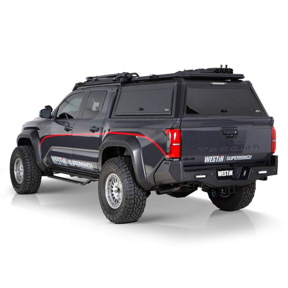 Gray Toyota Tacoma with roof rack and Westin Superwinch on a white background